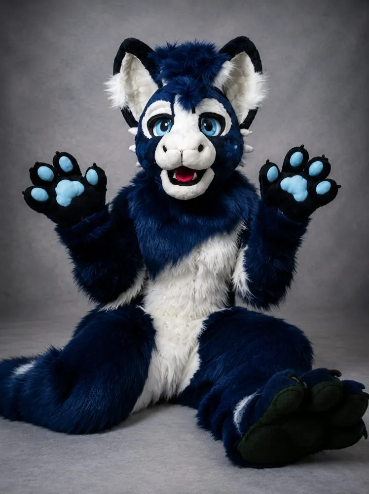 Blue fursuit showing paw pads