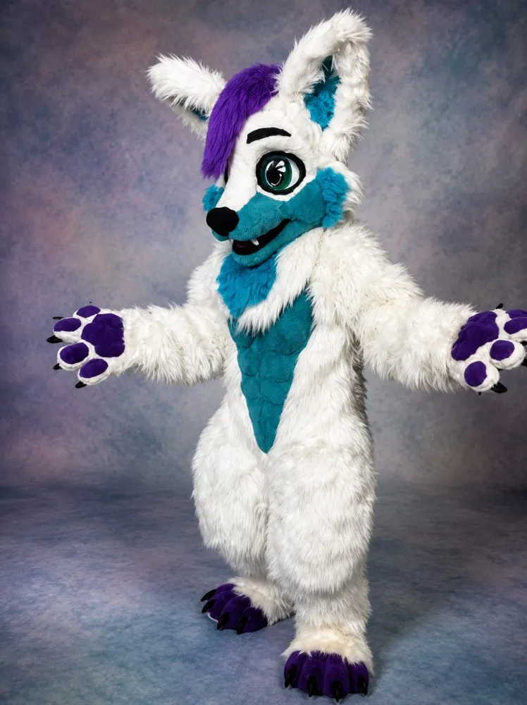 White fursuit with teal chest in neon-lit room